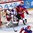 HELSINKI, FINLAND - JANUARY 4: Russia's Andrei Svetlakov #8 knocks USA's Colin White #18 into goaltender Ilya Samsonov #1 during semifinal round action at the 2016 IIHF World Junior Championship. (Photo by Matt Zambonin/HHOF-IIHF Images)

